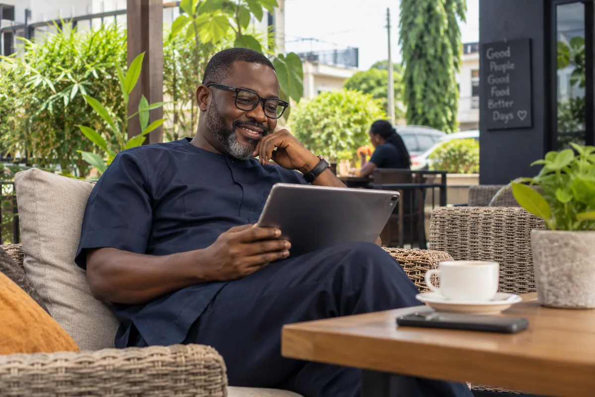 Property owner reviewing connected property information on a tablet.